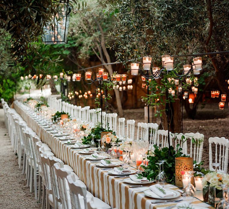 Wedding Table Decor with Candelabra &amp; Votive Decor | Paradise Destination Wedding at Jnane Tamsna in Marrakech, Morocco | Nordica Photography | Matteo Castelluccia Film