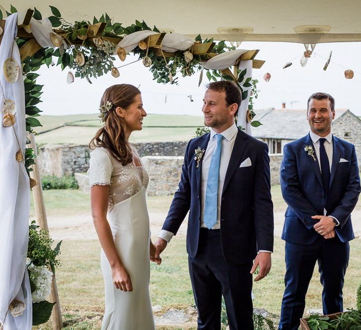 Outdoor ceremony under a stretch tent