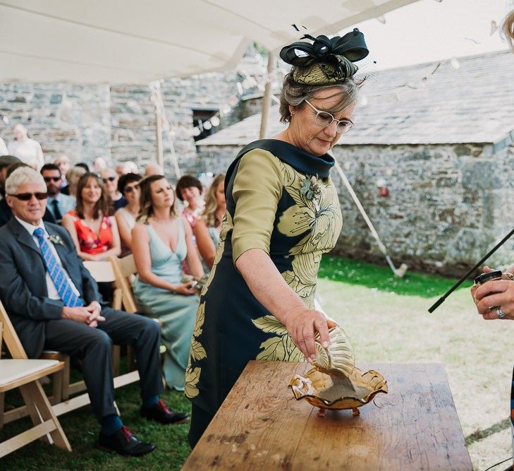 Sand ceremony under a stretch tent