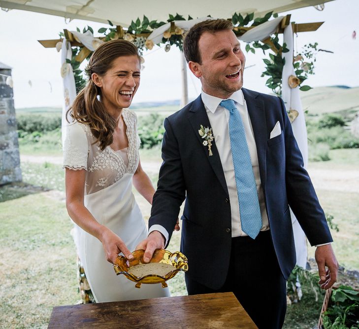 Stretch tent wedding with sand ceremony