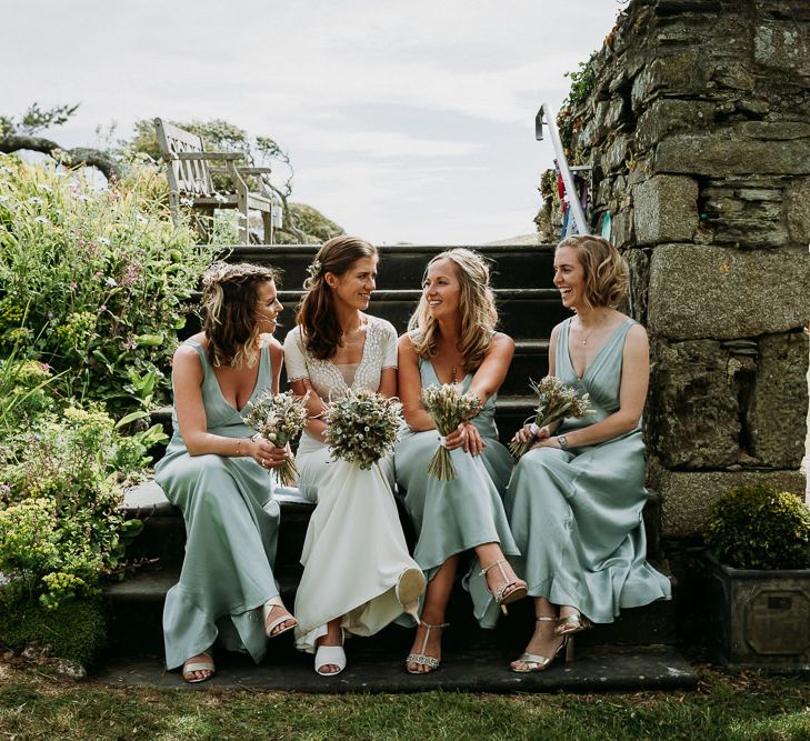 bridal party portrait at stretch tent wedding ceremony and marquee reception in Cornwall