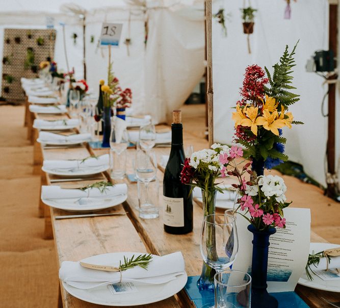 DIY table centrepieces at Cornish coastal wedding