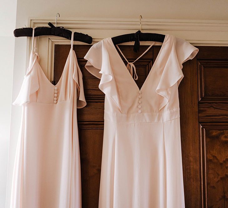 Cold frilled shoulder bridesmaid dresses with delicate button detailing