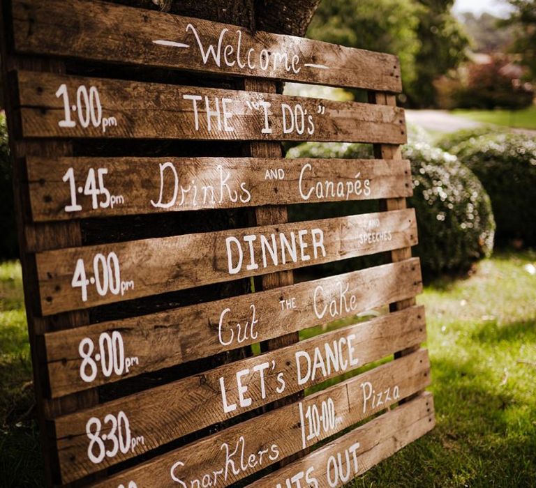 Wooden palette order of the day for relaxed autumn outdoor Dewsall Court wedding