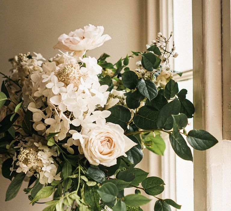 Beautiful white flower bouquet for sophisticated outdoor ceremony