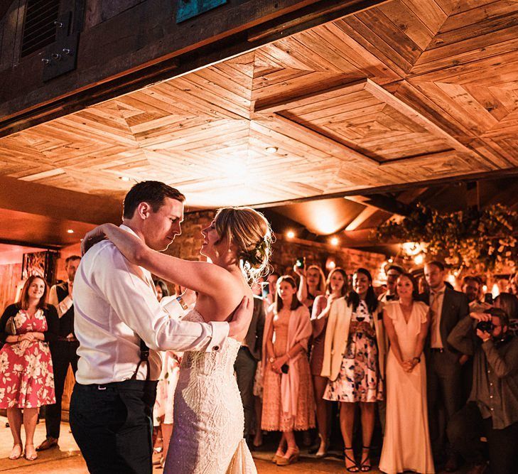 Bride and groom first dance at Dewsall Court Wainhouse barn