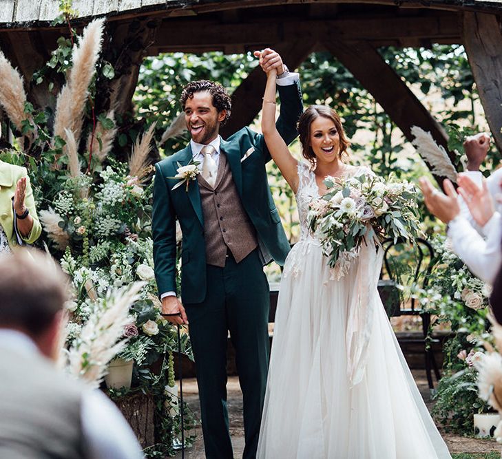 Wedding Ceremony | Bride in Antonia Berta Muse Wedding Dress | Groom in Navy Suit | Rustic Greenery Wedding at Cripps Barn Cotswolds | Wedding_M Photography