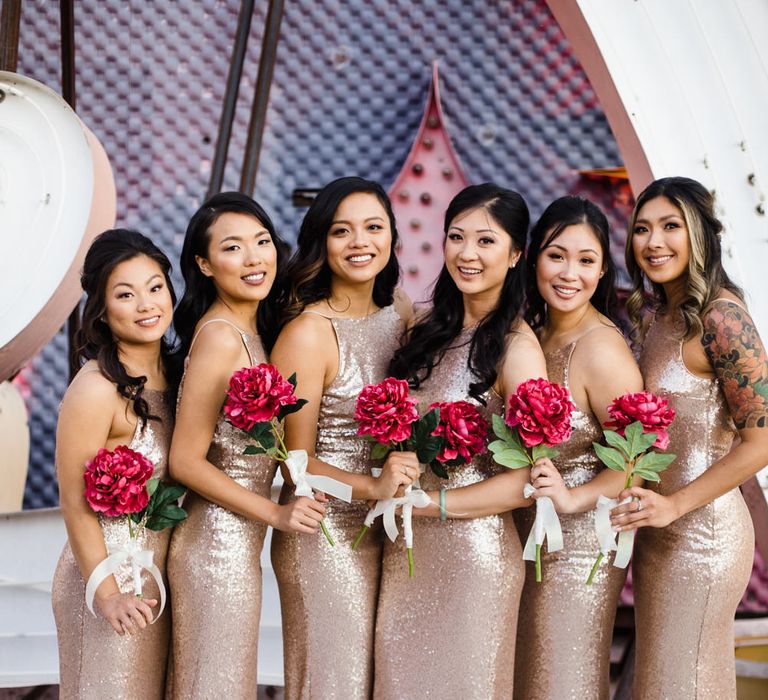 Bridesmaids in Gold Sequin Maxi Dresses with Cowl Back | Fuschia Sweet Pea Spray Silk Flower Bouquets | Las Vegas Wedding with Gold Sequin Bridesmaids Dresses and Silk Flowers | Chris Barber Photography