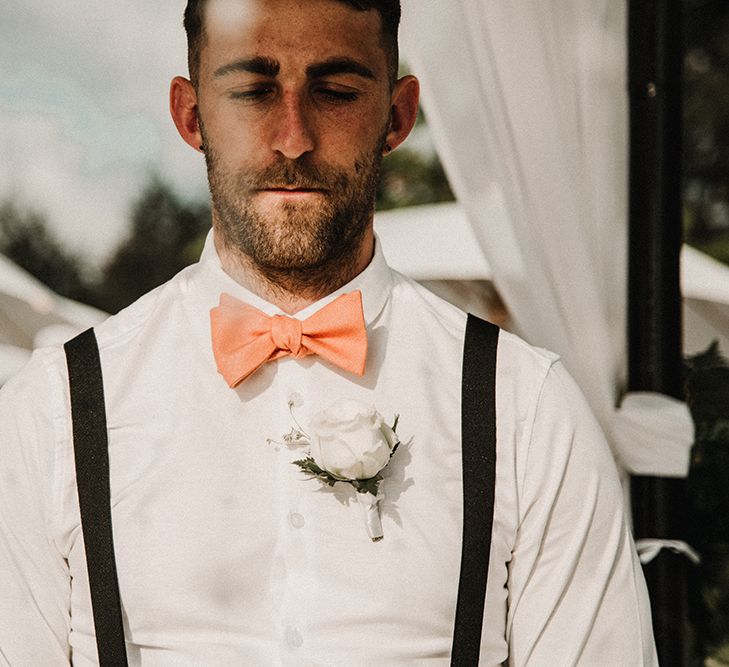 Groom at the Altar in Peach Bow Tie &amp; Braces | Tropical Destination on the Beach at Nice Sea Resort, Koh Phangan Thailand Planned by Phangan Weddings | Carla Blain Photography