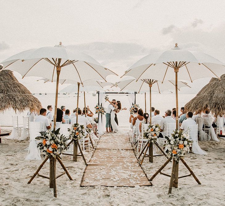 Wedding Ceremony | Bride in Grace Loves Lace Gia Gown | Groom in Turned Up Trousers, Bow Tie &amp; Braces from Topman | Tropical Destination on the Beach at Nice Sea Resort, Koh Phangan Thailand Planned by Phangan Weddings | Carla Blain Photography