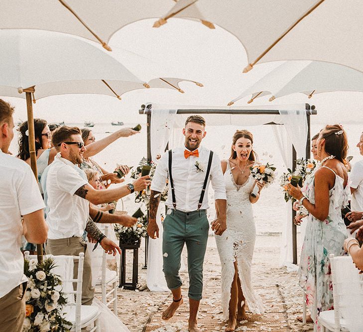 Wedding Ceremony | Bride in Grace Loves Lace Gia Gown | Groom in Turned Up Trousers, Bow Tie &amp; Braces from Topman | Tropical Destination on the Beach at Nice Sea Resort, Koh Phangan Thailand Planned by Phangan Weddings | Carla Blain Photography