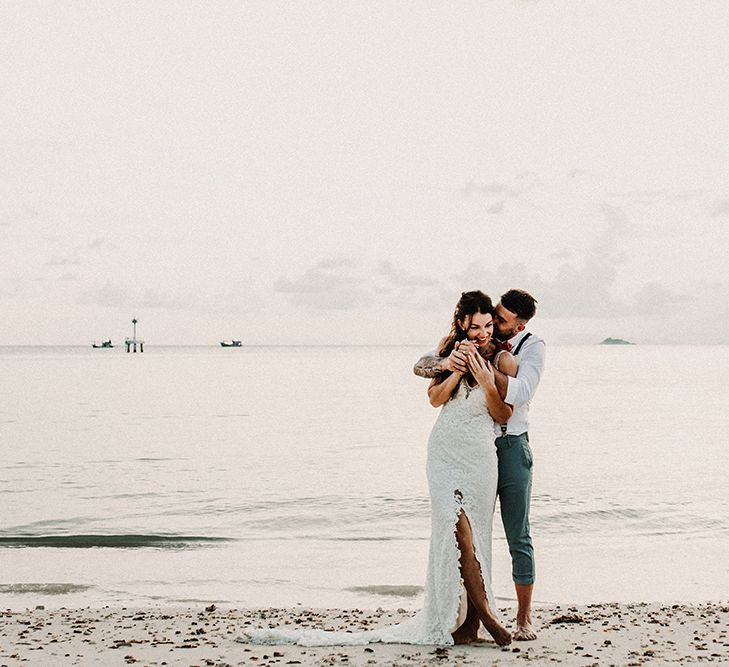 Couple Portrait | Bride in Grace Loves Lace Gia Gown | Groom in Turned Up Trousers, Bow Tie &amp; Braces from Topman | Tropical Destination on the Beach at Nice Sea Resort, Koh Phangan Thailand Planned by Phangan Weddings | Carla Blain Photography