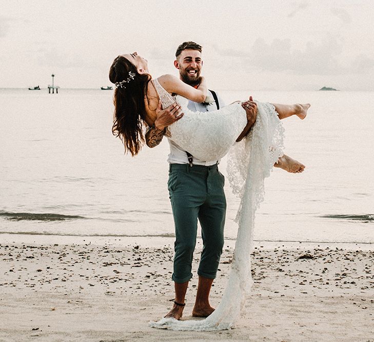 Couple Portrait | Bride in Grace Loves Lace Gia Wedding Dress | Groomsmen in Turned Up Trousers, Bow Ties &amp; Braces from Topman | Tropical Destination on the Beach at Nice Sea Resort, Koh Phangan Thailand Planned by Phangan Weddings | Carla Blain Photography