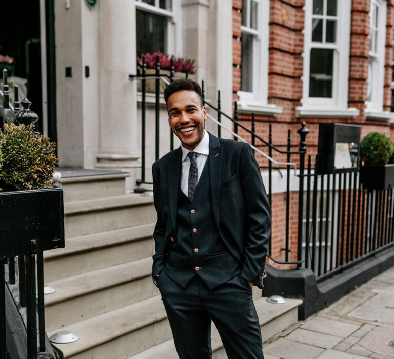 Groom in Three Piece Navy Suit