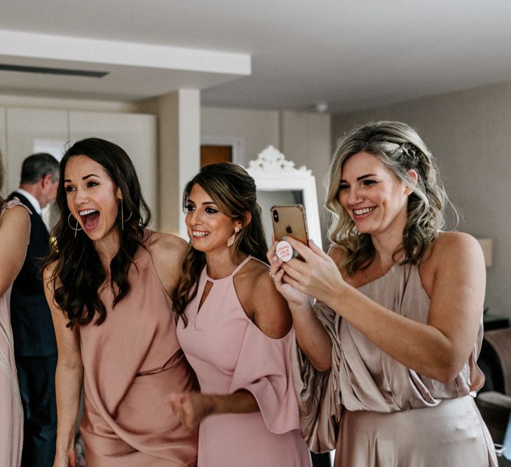 Bridesmaid First Look in Different Pink Dresses