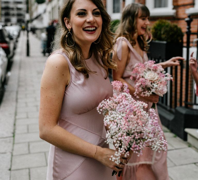 Bridesmaid in Ghost Satin Dress with Pink Gypsophila Bouquet