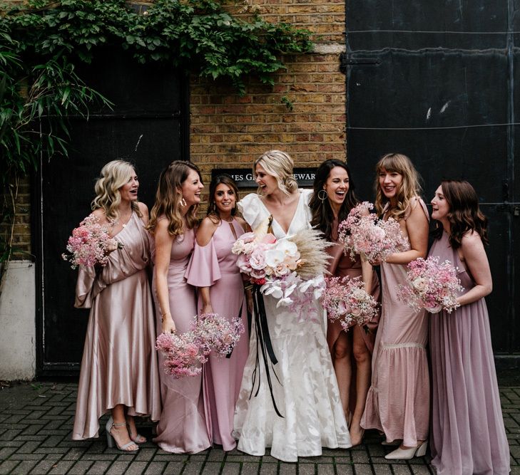 Bridesmaids in Different Pink Satin and Chiffon Dresses