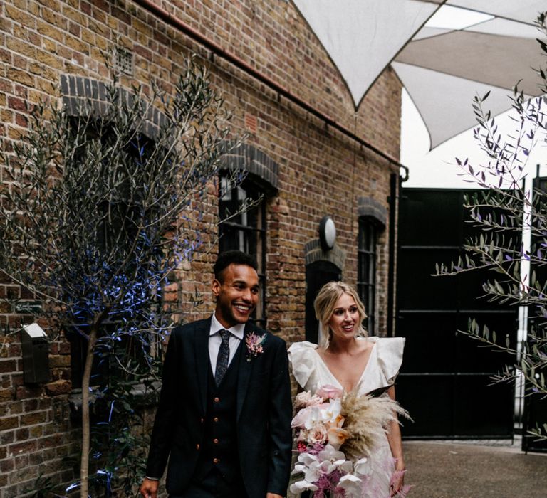 Stylish Bride and Groom in Ruffle Wedding Dress and Three Piece Suit