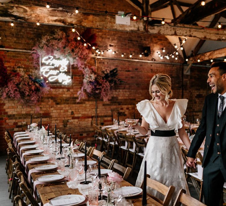 Bride and Groom Standing in their Wedding Reception