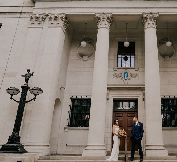 Bride and Groom Outside London Ceremony Venue