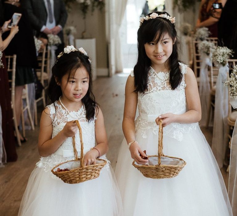 Flower girls during wedding ceremony in Essex