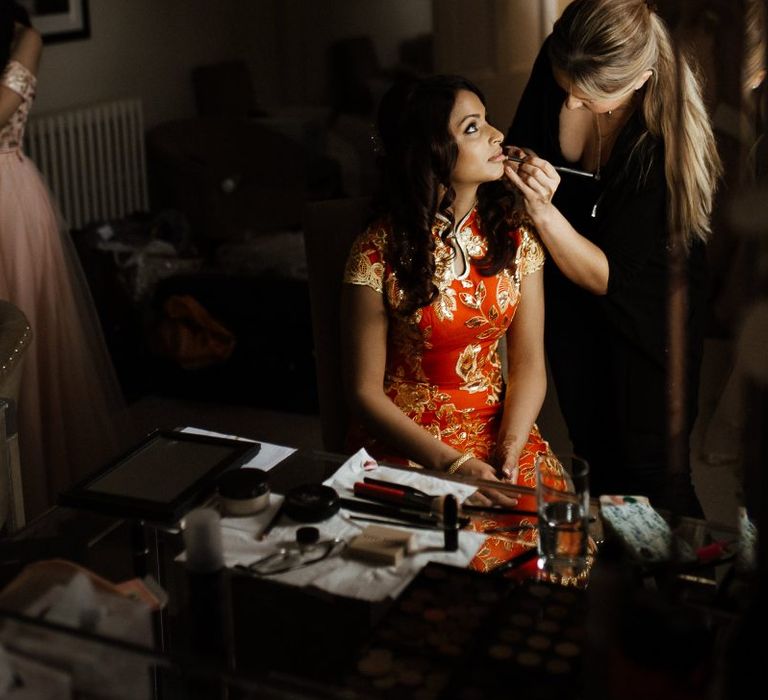 Bridal beauty before Chinese tea ceremony and outfit change to Indian wedding dress