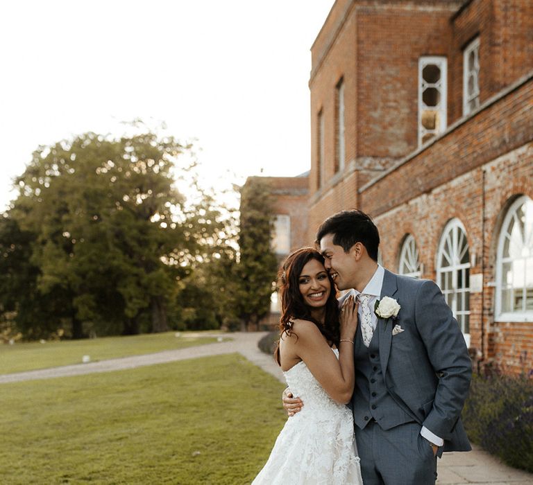 Bride and groom at fusion wedding before outfit change into traditional Indian wedding dress