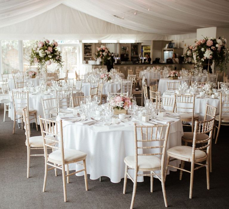 Wedding table setting with pink wedding flowers