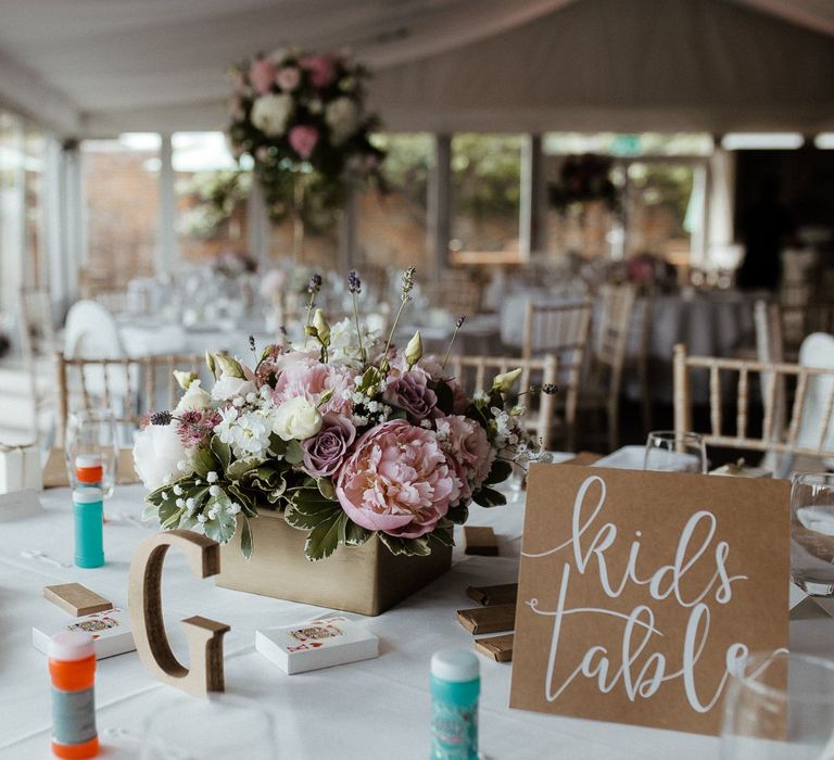 Dedicated kids table at fusion wedding