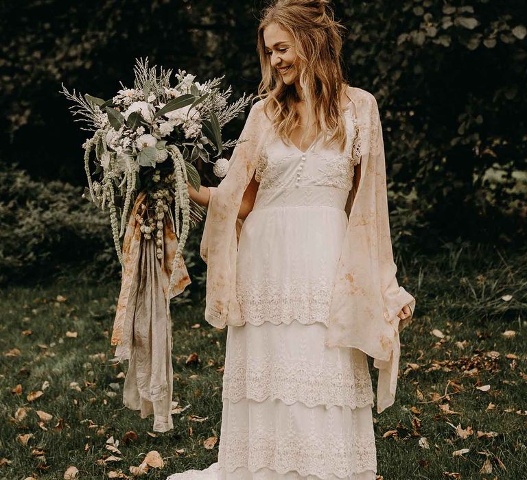 Boho Bride in Lade Wedding Dress &amp; Oversized Bridal Bouquet with Ribbon &amp; Foliage | Nude Bohemian Wedding Inspiration by Wonderland Invites &amp; Rock The Day Styling | Kelsie Low Photography