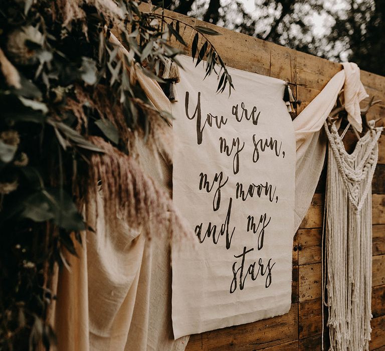 Fabric Flag Backdrop, Dried Flowers &amp; Macrame Hanging | Nude Bohemian Wedding Inspiration by Wonderland Invites &amp; Rock The Day Styling | Kelsie Low Photography