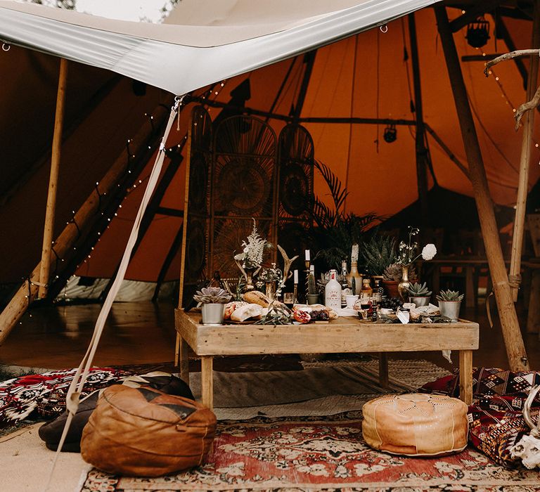 Rustic Tipi with Persian Rugs &amp; Moroccan Poufs | Nude Bohemian Wedding Inspiration by Wonderland Invites &amp; Rock The Day Styling | Kelsie Low Photography