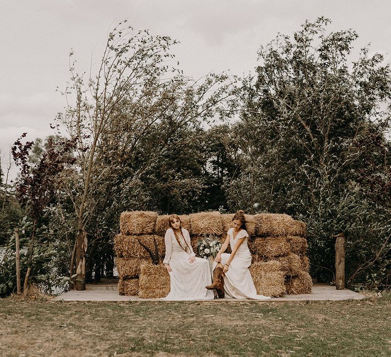 Hay Bale Seating Area | Boho Brides in Lace Dresses from Rock The Frock Bridal | Nude Bohemian Wedding Inspiration by Wonderland Invites &amp; Rock The Day Styling | Kelsie Low Photography