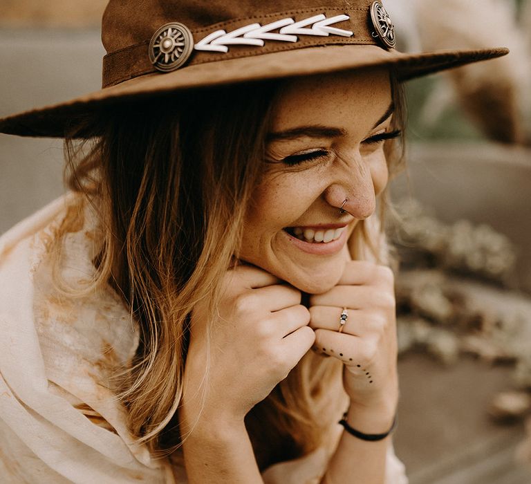 Boho Bride in Lace Dress &amp; Hat | Drapes, Dried Flowers &amp; Macrame Decor | Wooden Table with Candle Sticks &amp; Greenery Garland | Nude Bohemian Wedding Inspiration by Wonderland Invites &amp; Rock The Day Styling | Kelsie Low Photography