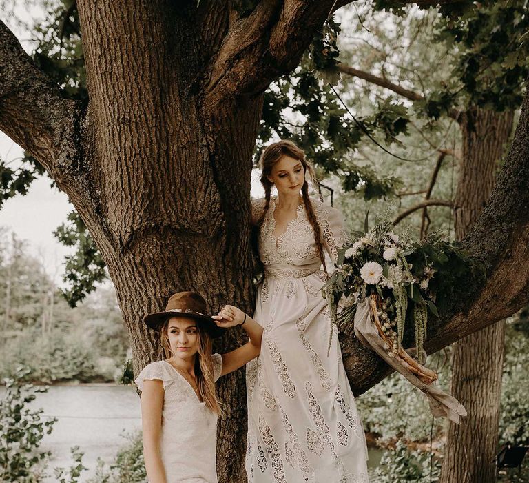 Boho Brides in Hat, Succulent Flower Crown &amp; Lace Rock The Frock Bridal Gown | Macrame Wall Hanging &amp; Dried Flowers | Nude Bohemian Wedding Inspiration by Wonderland Invites &amp; Rock The Day Styling | Kelsie Low Photography