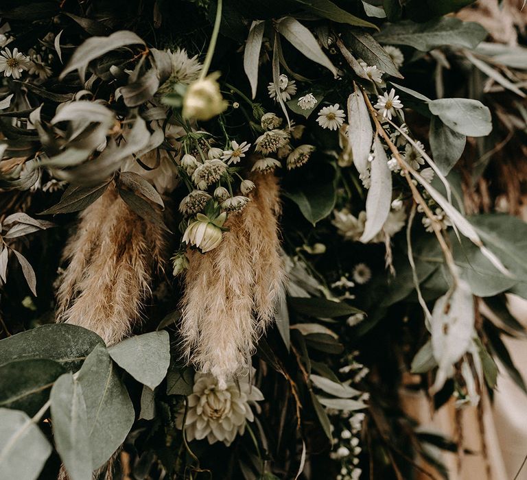 Dried Wedding Flowers with Pampas Grass | Wooden Table with Candle Sticks &amp; Greenery Garland | Nude Bohemian Wedding Inspiration by Wonderland Invites &amp; Rock The Day Styling | Kelsie Low Photography