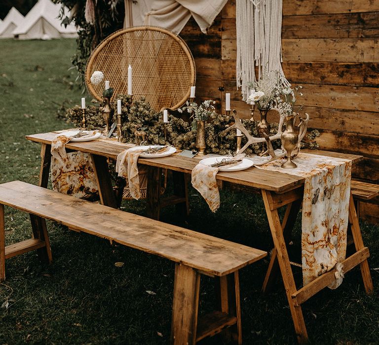 Drapes, Dried Flowers &amp; Macrame Decor | Wooden Table with Candle Sticks &amp; Greenery Garland | Nude Bohemian Wedding Inspiration by Wonderland Invites &amp; Rock The Day Styling | Kelsie Low Photography