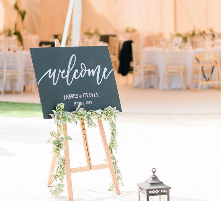 Chalkboard Wedding Welcome Sign with Storm Lantern