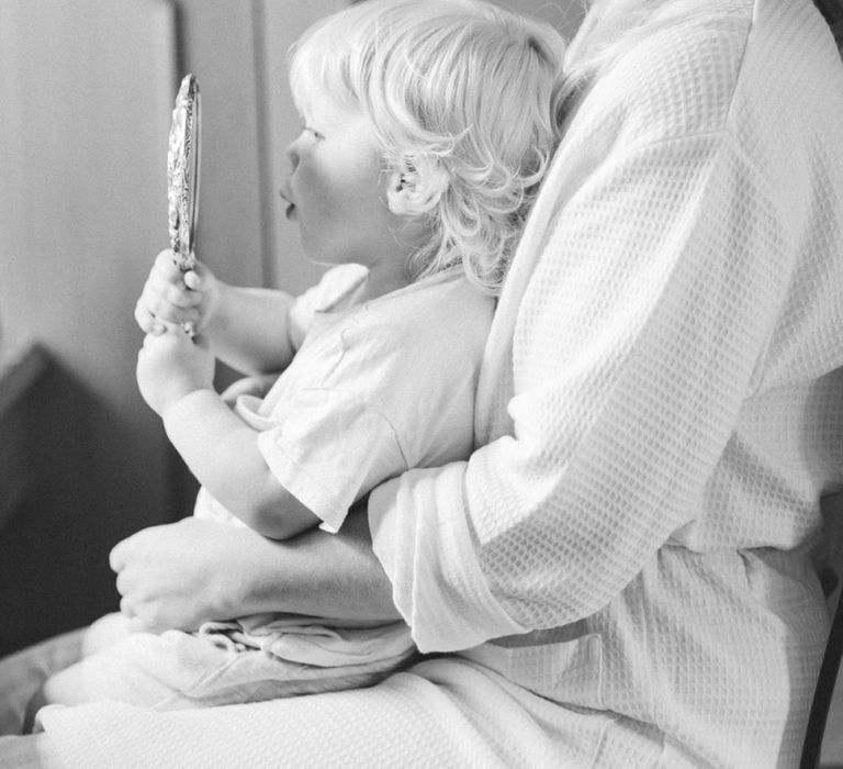 Bride in Getting Ready Robe with Son on Her Lap