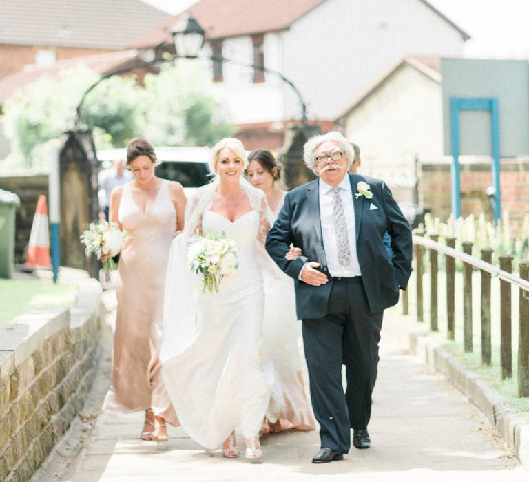 Bridal Party Walking to the Wedding Ceremony