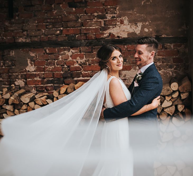 Couple shot | Veil | Blush Pink and Copper | RMW The List Members Hazel Gap Barn, Nottinghamshire | Mikaella Bridal Gown | Pear and Bear Photography