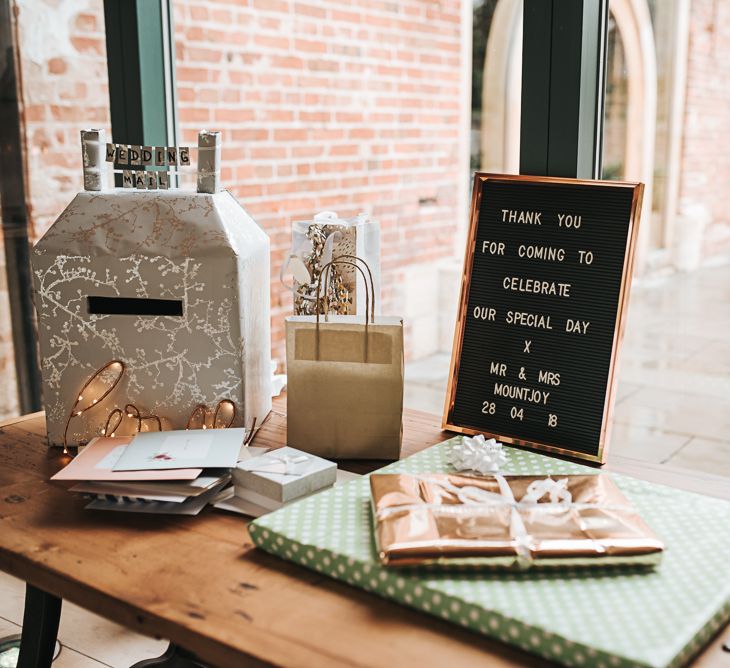 Table detail and decor | Gift Table | Blush Pink and Copper | RMW The List Members Hazel Gap Barn, Nottinghamshire | Mikaella Bridal Gown | Pear and Bear Photography