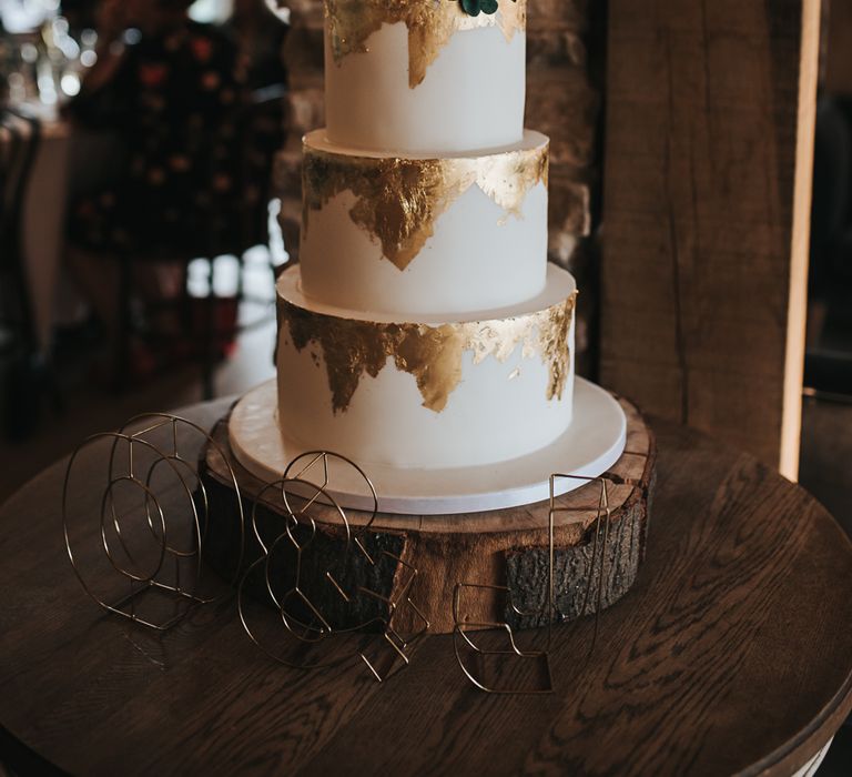 White iced and metallic foiled cake | Blush Pink and Copper | RMW The List Members Hazel Gap Barn, Nottinghamshire | Mikaella Bridal Gown | Pear and Bear Photography