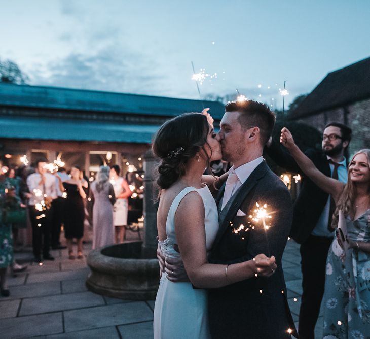 Sparklers on exit | Blush Pink and Copper | RMW The List Members Hazel Gap Barn, Nottinghamshire | Mikaella Bridal Gown | Pear and Bear Photography