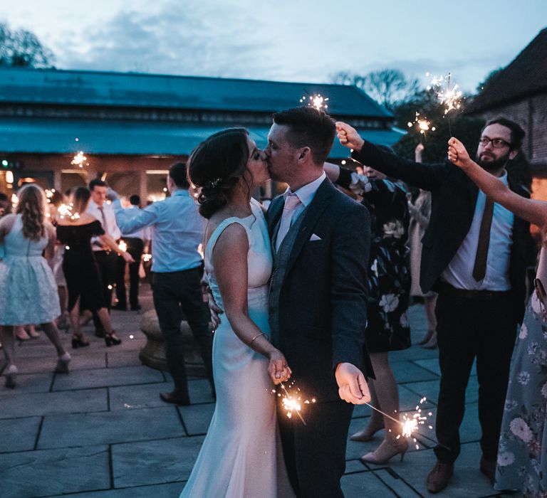 Sparklers on exit | Blush Pink and Copper | RMW The List Members Hazel Gap Barn, Nottinghamshire | Mikaella Bridal Gown | Pear and Bear Photography