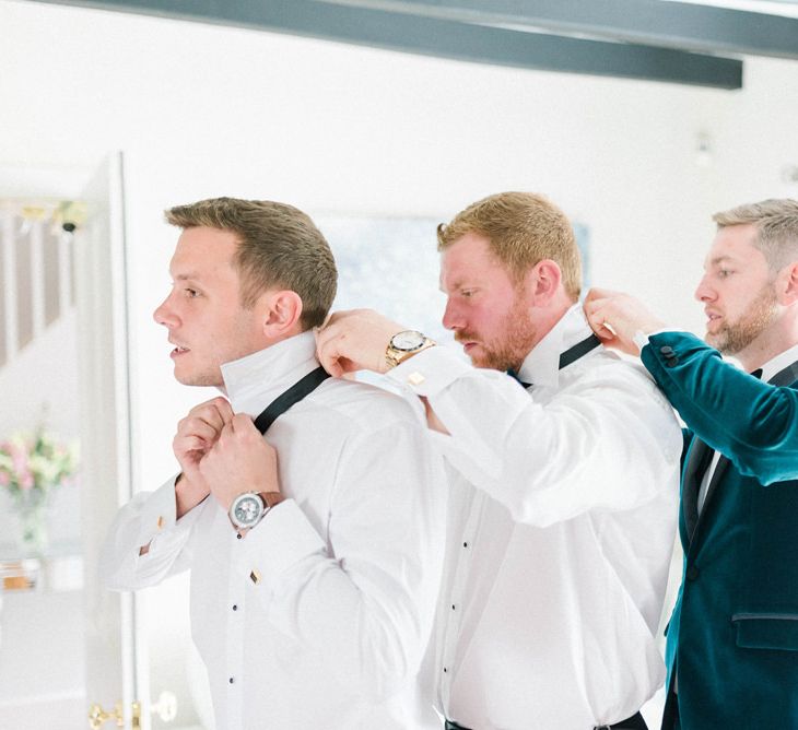 Groom preparations for wedding