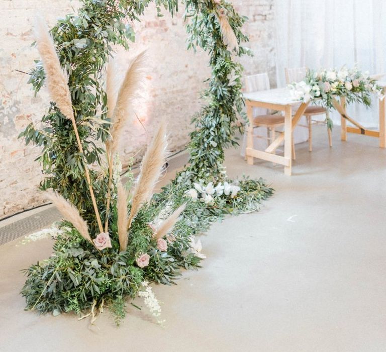 Pampas grass and foliage moon gate