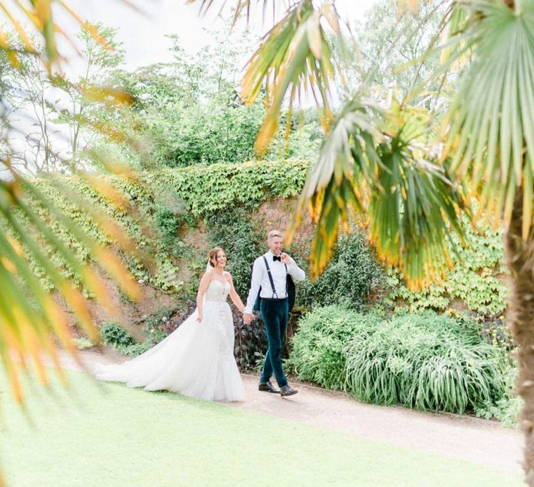 Bride in detachable skirt wedding dress with groom