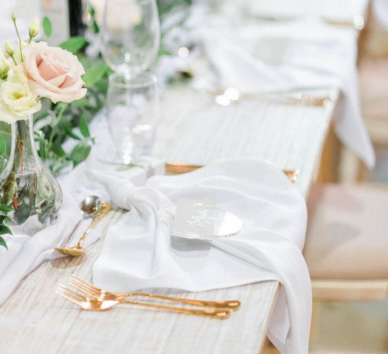 Wedding breakfast decor with foliage and flowers