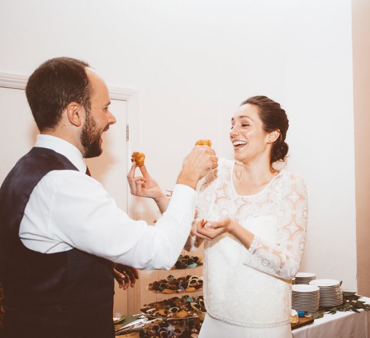 Croquembouche Wedding Cake | Bride in Laure de Sagazan Gown | Groom in Reiss Suit | Autumn City Wedding at Clissold House,  West Reservoir Centre | A Thing Like That Photography